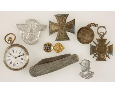 SECOND WORLD WAR NAZI BADGES, a silver cased pocket watch, and other related items.