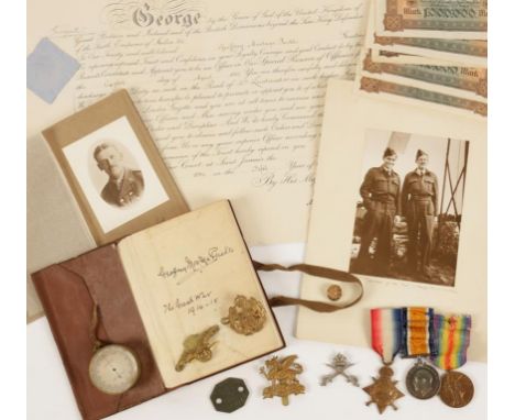 A GREAT WAR GROUP OF MEDALS, 1914-15 Star impressed (2. LIEUT: G.M. PUCKLE. E. SURR: R.), dog tag, cap badges, Field Service 