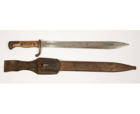 A GREAT WAR GERMAN BAYONET impressed "Deutsche Maschinensabrik, A-G Duisburg", in original scabbard with leather frog, 52cm.