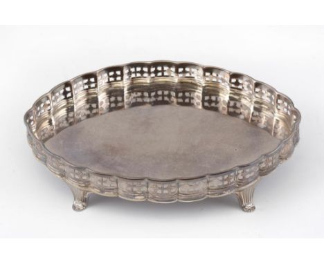 A GEORGE III OVAL SILVER TEAPOT STAND with pierced gallery, crested, 16.5cm w, by John Younge & Sons, Sheffield 1791, 4ozs 15