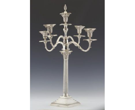 AN EDWARD VII SILVER FIVE LIGHT COLUMNAR CANDELABRUM with nozzles and finial, 67cm h, by W Hutton & Sons Ltd, London 1903, 5 