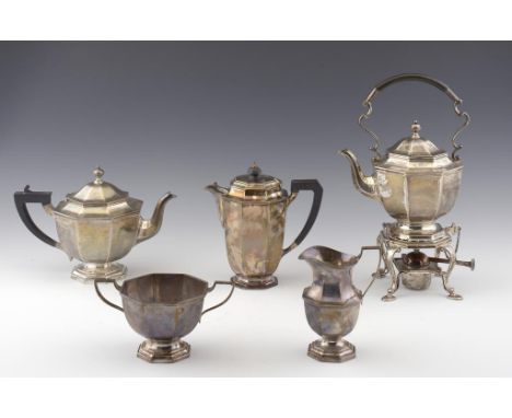 A GEORGE V SILVER FOUR PIECE TEA  SERVICE AND A SIMILAR LIDDED JUG  of octagonal shape, kettle 34cm h, by Mappin & Webb Ltd, 