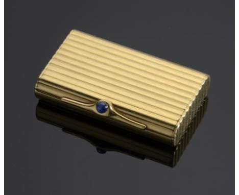 AN ENGLISH 18CT GOLD REEDED SNUFF BOX BY KUTCHINSKY  with rounded sides and sapphire cabochon thumbpiece, 5.1cm w, maker's ma