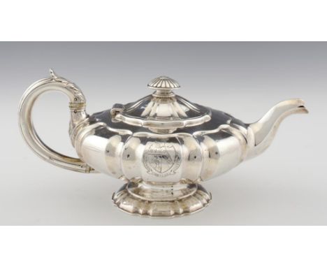 A WILLIAM IV SILVER MELON SHAPED TEAPOT  engraved with armorials, 13cm h, by Michael Starkey, London 1832, 22ozs tdwts ++Ligh