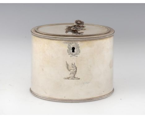 A GEORGE III SILVER TEA CADDY  of beaded oval shape with integral hinge and engraved with armorials, associated flower finial