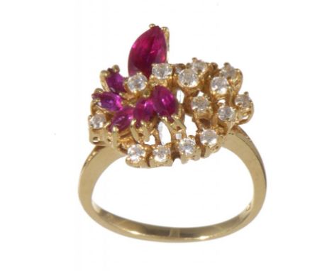 A RUBY AND DIAMOND COCKTAIL RING, PROBABLY FRENCH with larger marquise ruby in gold, indistinct maker's and control marks, 6.