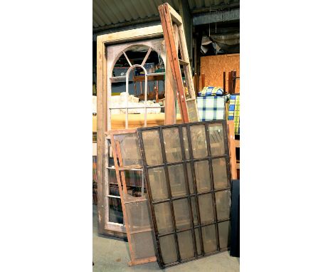 A VICTORIAN PINE SASH WINDOW AND FRAME the upper half arched, 254 x 98cm