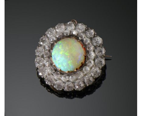 A VICTORIAN OPAL AND DIAMOND 'TARGET' BROOCH, C1890 in gold, 2.3cm, 7.3g ++Fine quality and condition the diamonds clean and 