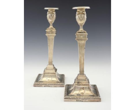 A PAIR OF GEORGE III NEO CLASSICAL STYLE SILVER CANDLESTICKS  with nozzles, 32cm h, by William Abdy, London 1784, loaded ++Go