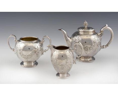 A VICTORIAN SILVER GLOBULAR TEA SERVICE  embossed with swags, teapot 17cm h, by Elkington & Co, Birmingham 1859, 48ozs 10dwts