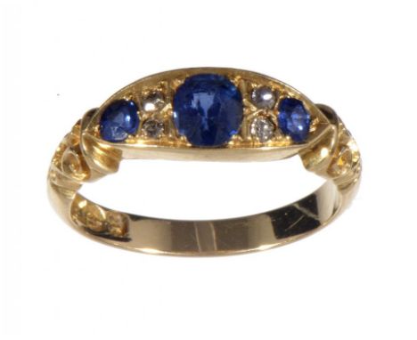 A VICTORIAN SAPPHIRE AND DIAMOND RING in 18ct gold, Chester 1900, 4.3g, size L½  ++Fine condition with some very light wear s