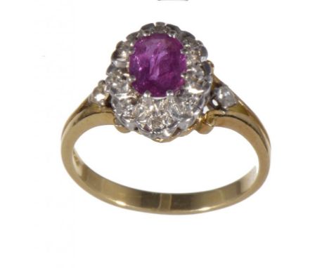 A RUBY AND DIAMOND CLUSTER RING in 18ct gold, London 1976, 4.2g, size N ++Satisfactory second hand condition