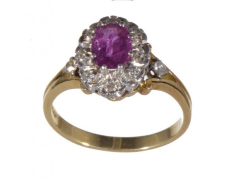 A RUBY AND DIAMOND CLUSTER RING in 18ct gold, London 1976, 4.2g, size N ++Satisfactory second hand condition