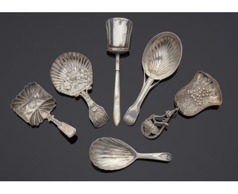 A GEORGE III DIE STAMPED SILVER CADDY SPOON of flower basket and shell design, 8cm l, by Joseph Taylor, Birmingham 1818, a Vi