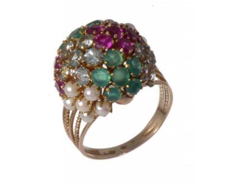 A RUBY, EMERALD, PEARL AND ZIRCON DOMED CLUSTER RING in gold with wirework hoop, marked KS and indistinct foreign control mar