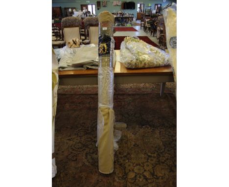 Roll of bronze fabric