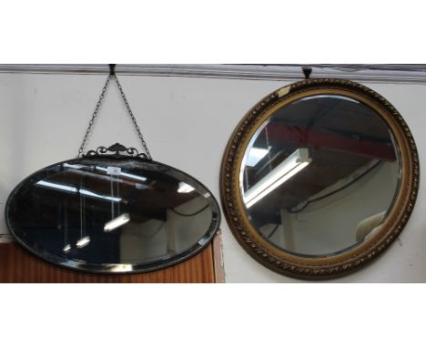 A gilt wall mirror and two other mirrors together with assorted prints
