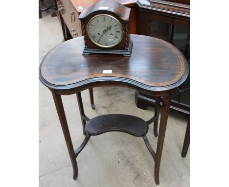 An Edwardian mahogany occasional table together with an oak mantle clock