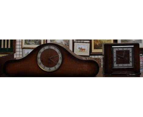 A walnut Symphonie mantle clock together with a small walnut mantle clock