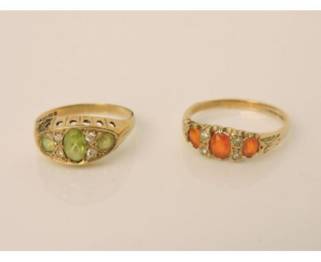 A 9ct gold peridot and diamond boat shaped ring, and a 9ct gold fire opal and diamond boat shaped ring