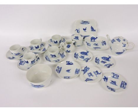 A Spode child's tea service, including five cups and saucers, teapot, sugar bowl, jug and two sandwich plates, white ground w