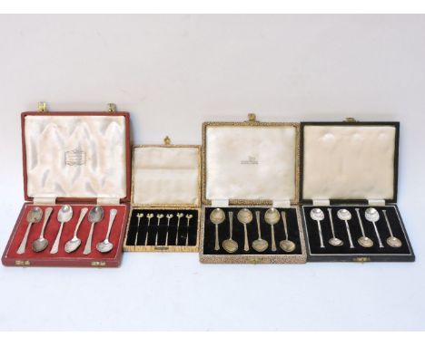 Six silver gilt and enamel teaspoons, Walker & Hall, Birmingham, 1967, together with a set of six silver teaspoons, six silve