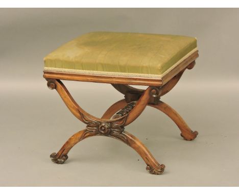 A Victorian walnut 'X' frame stool, with green upholstered top, stamped initials