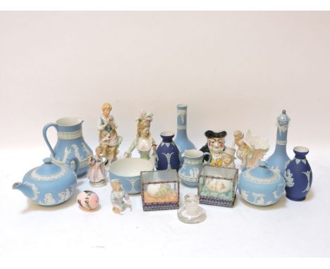 A Wedgwood jasperware tea set, jasperware vases, porcelain figures