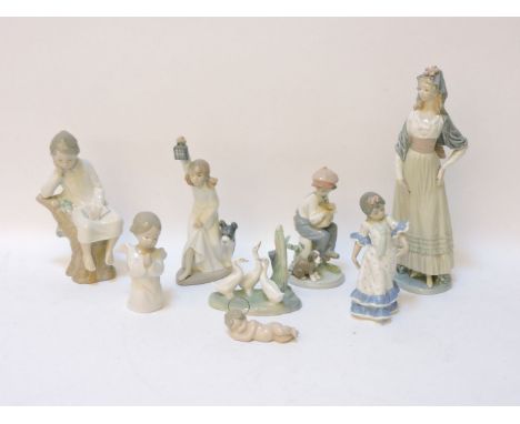 Six Lladro figures, to include Goya lady, a Nao figure of a girl with lamp and a Nao geese group, tallest 32cm (8)