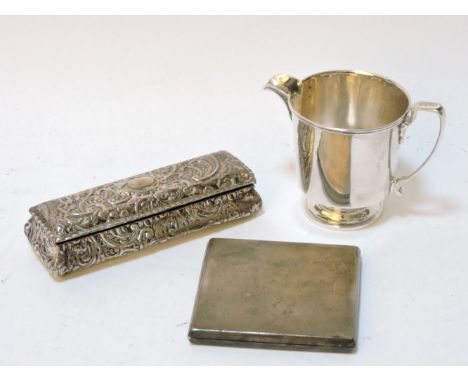 An early 20th century silver compact with engine turned decoration, together with a small rectangular trumpet box and a cream