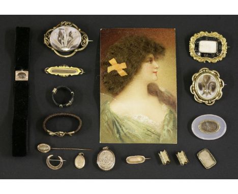 A Victorian gold and black champlevé enamel memorial bar brooch,with woven hair beneath a glazed cover,together with assorted