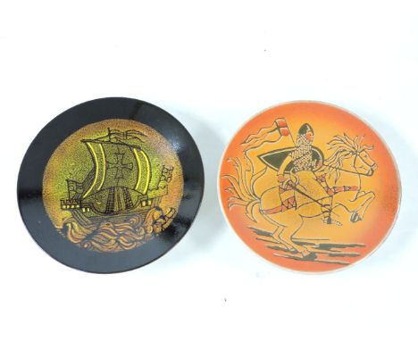 Two Poole pottery Aegean chargers, one depicting a knight on horseback, on an orange ground, 41cm diameter, and another of a 