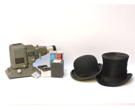 A vintage Pathe 95 Cine Film projector, in original case and a Kodaslide model 5 projector, a Harrods bowler hat, and a M. Mi