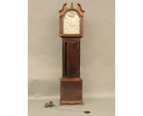 A George III mahogany longcase clock, the eight day movement to an arch top painted dial,217cm high