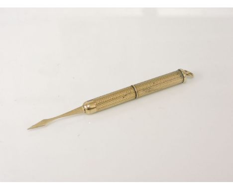 A 9ct gold engine turned decorated self propelling toothpick, by SJ Rose, 5.6g