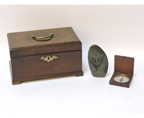 A George III mahogany tea caddy, 23cm wide,and compass and an Inuit carving