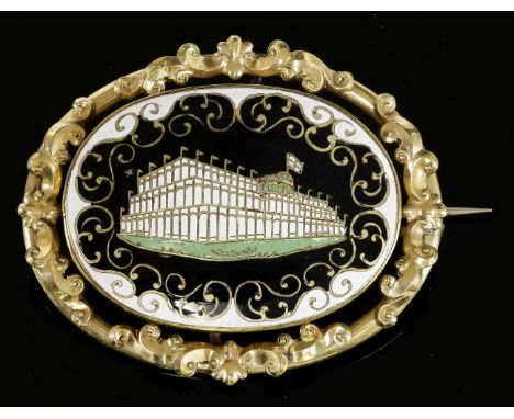 A Victorian rolled gold brooch, c.1851,with a polychrome enamel centre, depicting the Crystal Palace