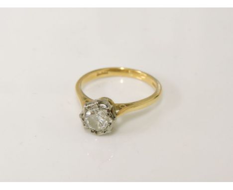 An 18ct gold illusion set single stone diamond ring, size M, 3.20g