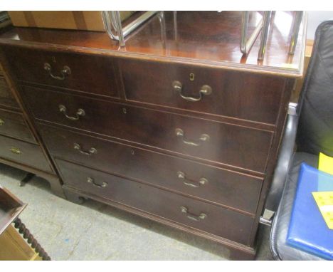 A Georgian mahogany chest of two short and two long drawers having swan neck handles and bracket shaped feet 41"h x 43 3/4"w 