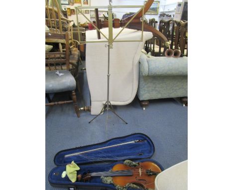 An early 20th century German Sander Dynasty &amp; Co two piece Back violin, cased, and a metal music stand 