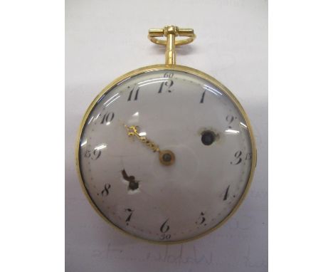 A late 18th/early 19th century French yellow metal verge pocket watch, having a white enamel dial, wound through dial at 2, f