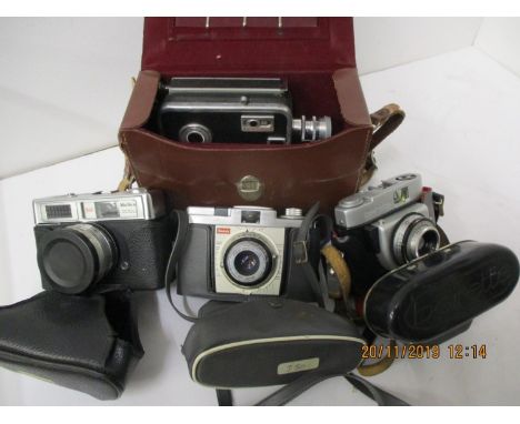 A vintage Opticom editor viewer, a Halima 3000, a Kodak Coloursnap 35, a Berrette and a cine camera, together with reels 