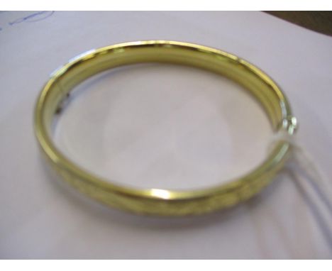 A yellow metal bangle, 13.1g 
