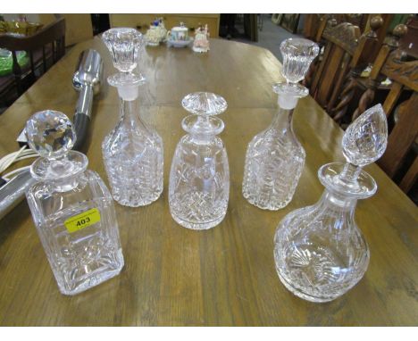 Cut and pressed glass decanters to include a pair of decanters, a Stuart crystal decanter and a Whisky decanter 