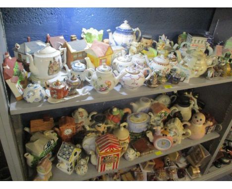 A collection of ceramic novelty teapots, Chinese enamel teapots and other items 