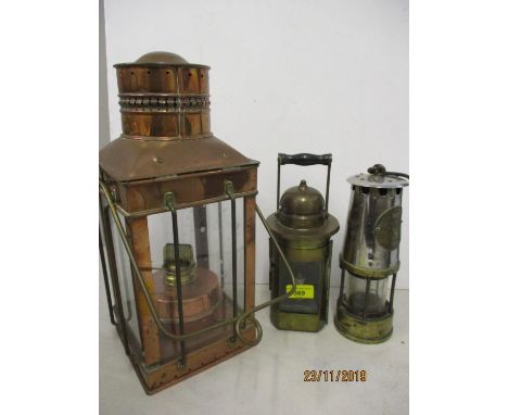 The Protector Lamp and Lighting Co Ltd, miners lamp and one other together with a copper cased oil lamp 