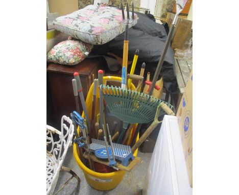 A selection of mainly garden tools contained in a trolley 