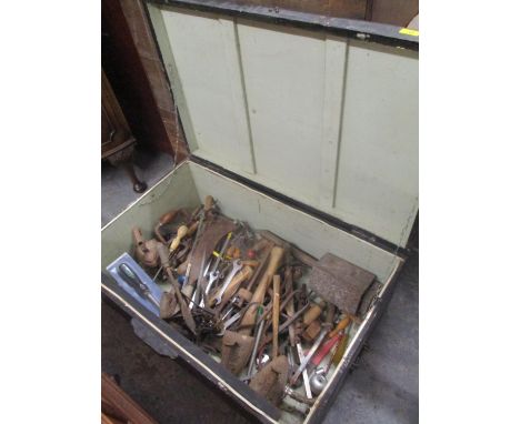 A vintage twin handled painted trunk containing mixed tools 