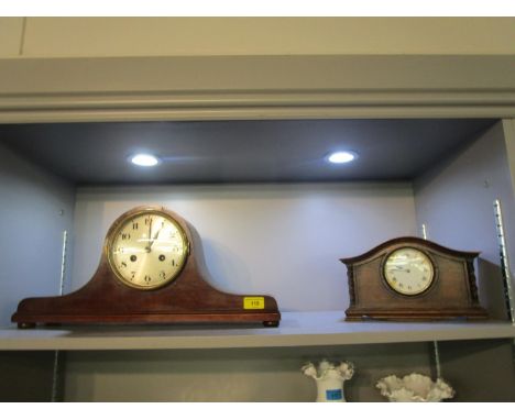 An early 20th mahogany Napoleon hat mantle clock and an oak cased mantle clock, the white enamel Roman dial flanked by barley
