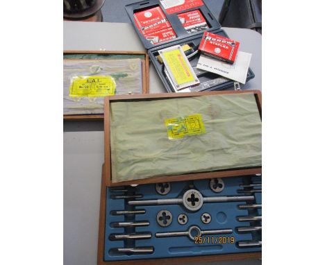 An Arrow multi purpose staple gun in a blue case, together with four boxes of staples and other tools 